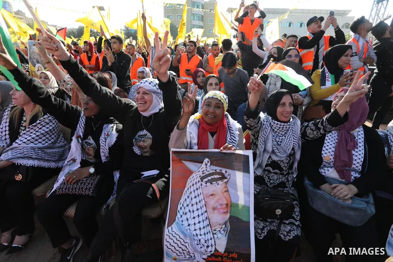 Palestinian supporters of Fatah movement attends the festival marking the 18th anniversary of the death of the late Palestinian President Yasser Arafat, in Gaza city on November 10, 2022. Arafat, also known as Abu Ammar...