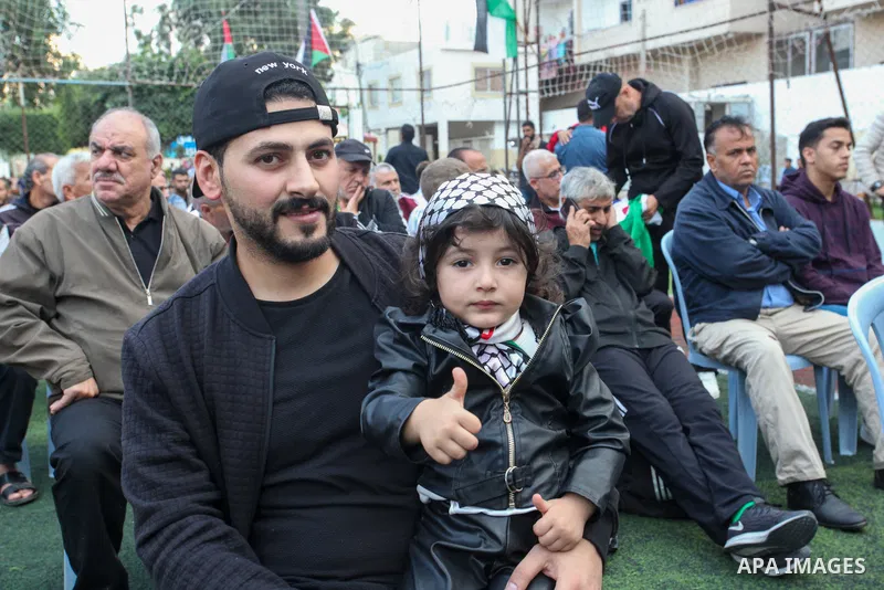 Palestinians attend an event marking the 18th anniversary of the death of the late Palestinian President Yasser Arafat, in Gaza city on November 13, 2022. Photo by Youssef Abu Watfa \ apaimages