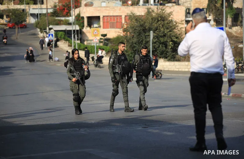 Israeli forces stand guard to secure and protect the settlers in the Sheikh Jarrah neighborhood of East Jerusalem during the Shimon Hatsadeq memorial, on October 24, 2022. Photo by Saeed Qaq\ apaimages