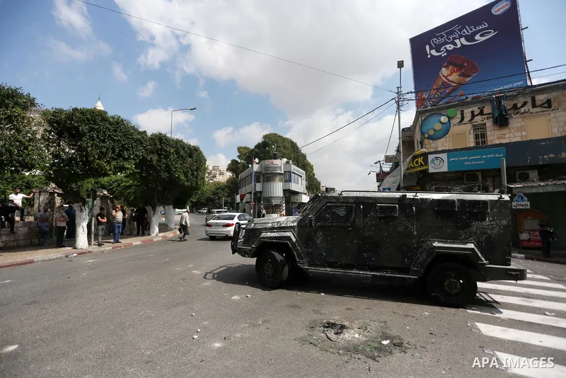 Palestinian protesters clash with Palestinian security forces in Nablus in the West Bank on September 20, 2022. Photo by Shadi Jarar'ah\ apaimages