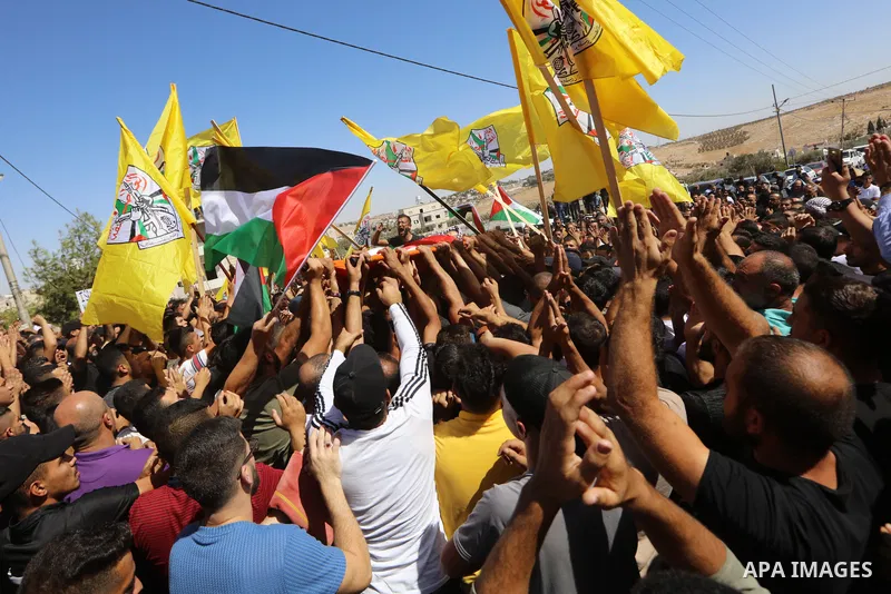 Mourners attend the funeral of seven-year-old Palestinian, Rayan Suleiman, who died the day before in unclear circumstances in the village of Tuqu, in the village, south of Bethlehem in the West Bank, on September 30, 20...