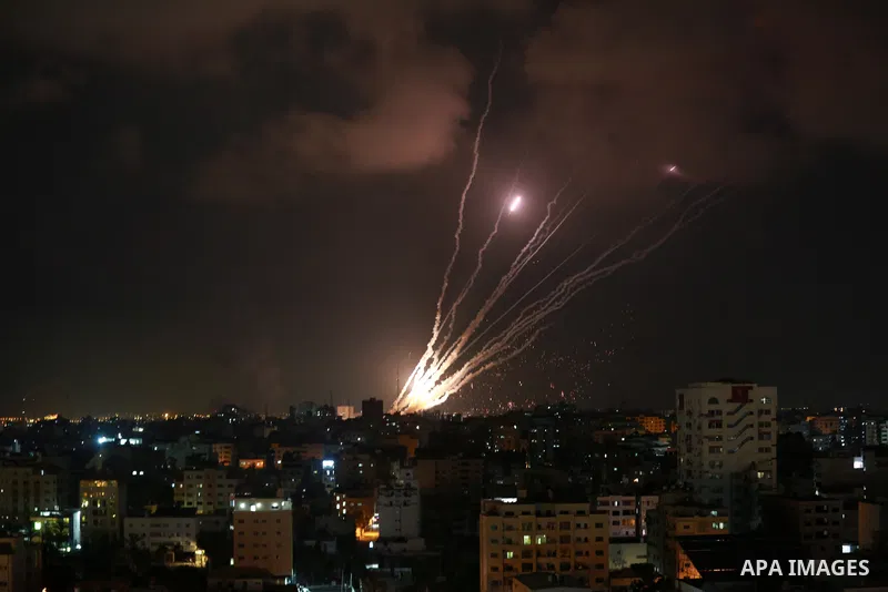 A salvo of rockets is fired from Gaza City toward Israel, on August 6, 2022. The Israeli military warned deadly aerial operations against militants in Gaza could last a week, as exchanges of fire were ongoing for a secon...