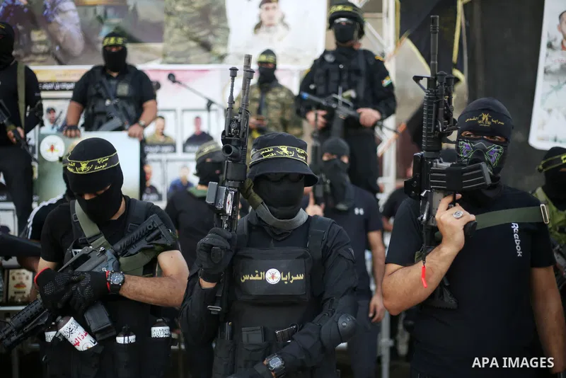 Militants of Al-Quds Brigades, the military wing of Palestinian Islamic Jihad movement take part in memorial service of Palestinians who were killed by Israeli forces in the West Bank and the latest Israel-Gaza conflict,...