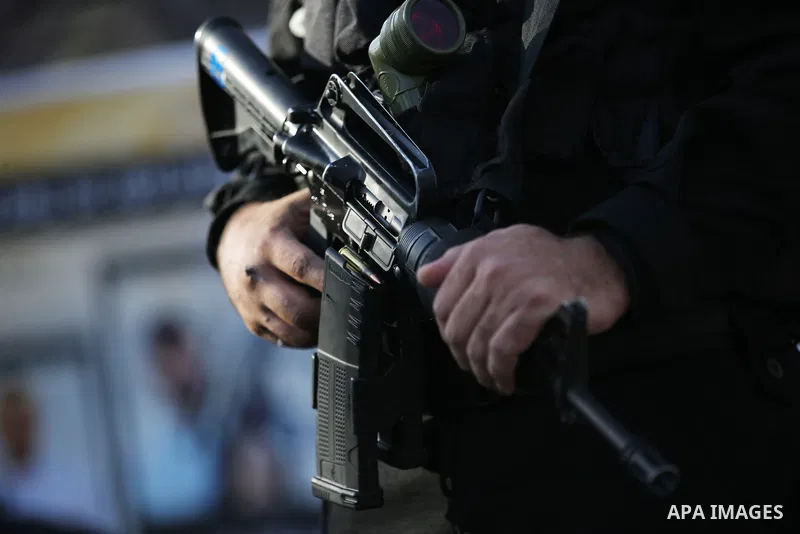 Militants of Al-Quds Brigades, the military wing of Palestinian Islamic Jihad movement take part in memorial service of Palestinians who were killed by Israeli forces in the West Bank and the latest Israel-Gaza conflict,...