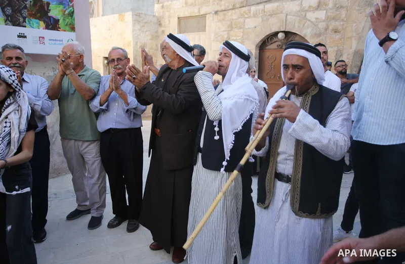 Palestinians wearing traditional dress during participation in the bride Exhibition in the northern town of Asira, north the West Bank city of Nablus on August 27, 2022. Photo by Shadi Jarar'ah\ apaimages