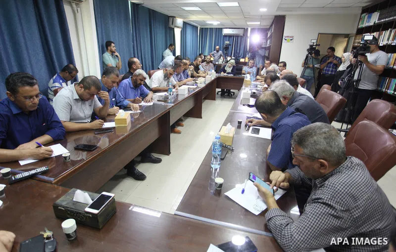 Palestinians attend a meeting on solidarity with prisoners in Israeli Jails in Gaza city on August 28, 2022. Palestinian freedom incarcerated in Israeli prisons dissolved today their representative bodies in all the pris...