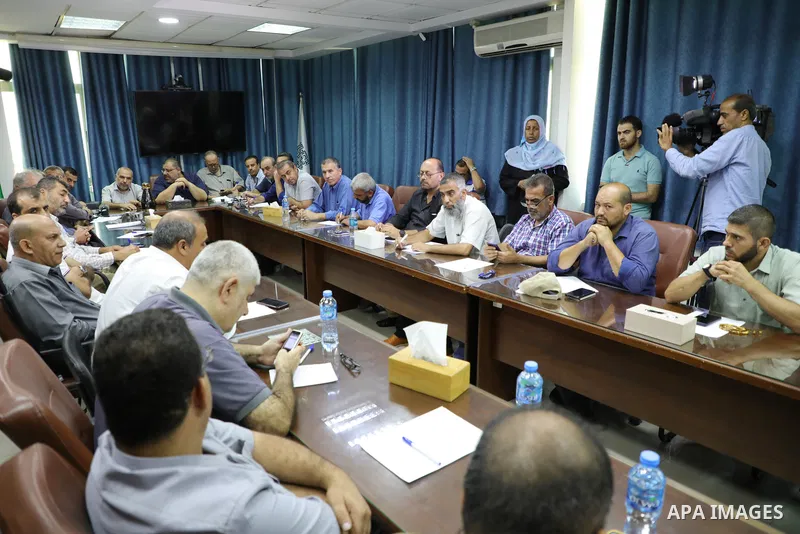 Palestinians attend a meeting on solidarity with prisoners in Israeli Jails in Gaza city on August 28, 2022. Palestinian freedom incarcerated in Israeli prisons dissolved today their representative bodies in all the pris...