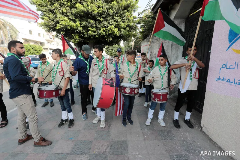 Palestinians attend the opening of a mural on the occasion of Malaysian National Day, in Gaza City on August 30, 2022. Malaysia's Independence Day is celebrated on August 31st. Also known as Merdeka Day (Freedom Day), th...