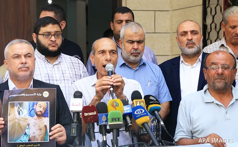 Members of Palestinian factions take part in a press conference in solidarity with prisoners on hunger strike in Israeli jails, in Gaza City on August 31, 2022. More than 4500 Palestinian freedom fighters incarcerated in...