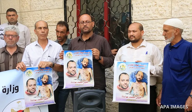 Members of Palestinian factions take part in a press conference in solidarity with prisoners on hunger strike in Israeli jails, in Gaza City on August 31, 2022. More than 4500 Palestinian freedom fighters incarcerated in...