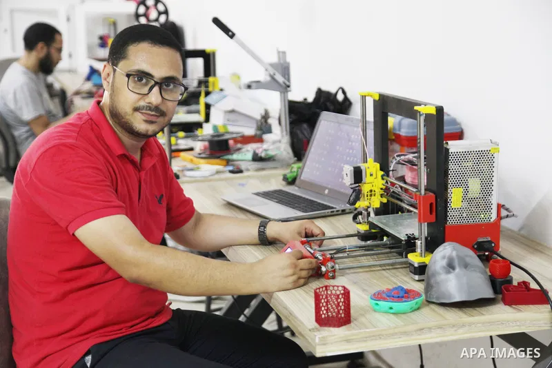 Palestinian engineer Mohammad Abu Matar, 35, uses 3D printing to produce the medical and educational equipment at a laboratory in Gaza City on August 31, 2022. Abu Matar, a specialist in digital manufacturing and 3D prin...