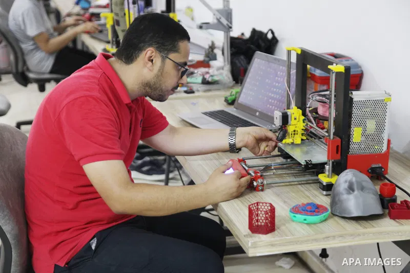 Palestinian engineer Mohammad Abu Matar, 35, uses 3D printing to produce the medical and educational equipment at a laboratory in Gaza City on August 31, 2022. Abu Matar, a specialist in digital manufacturing and 3D prin...