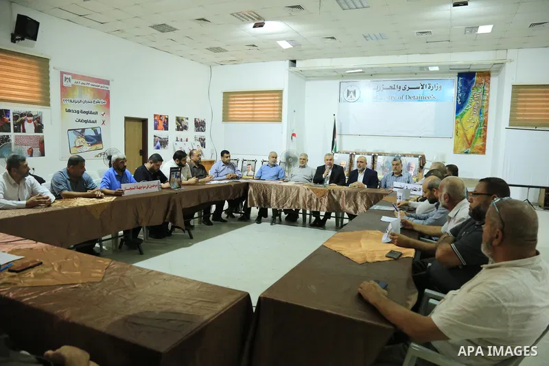 Members of Palestinian factions take part in a meeting in solidarity with prisoners on hunger strike in Israeli jails, in Gaza City on August 31, 2022. More than 4500 Palestinian freedom fighters incarcerated in Israel b...