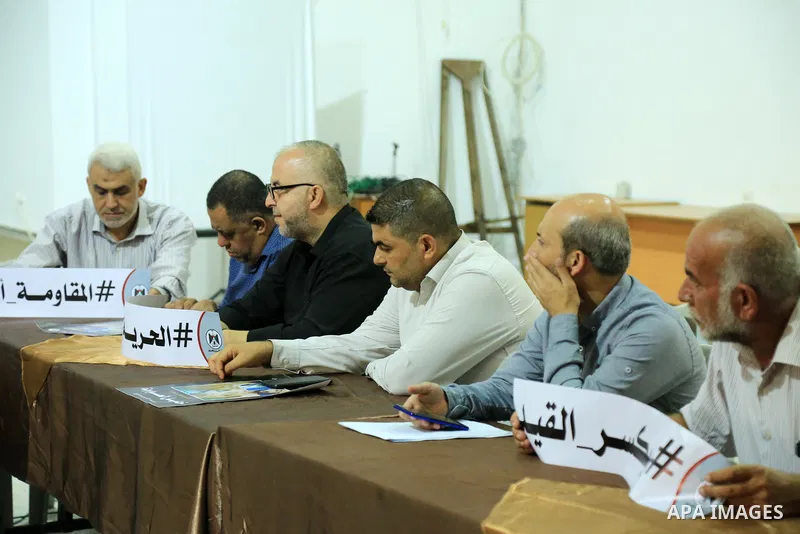 Members of Palestinian factions take part in a meeting in solidarity with prisoners on hunger strike in Israeli jails, in Gaza City on August 31, 2022. More than 4500 Palestinian freedom fighters incarcerated in Israel b...