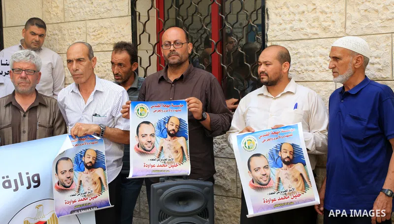 Members of Palestinian factions take part in a press conference in solidarity with prisoners on hunger strike in Israeli jails, in Gaza City on August 31, 2022. More than 4500 Palestinian freedom fighters incarcerated in...