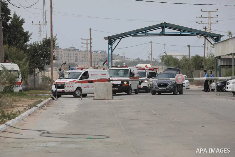 Palestinian ambulance drivers take part in a protest are called upon to pressure the Israeli to allow the free movement of patients through the Beit Hanoun checkpoint in front of the Erez Crossing in Beit Hanoun in the n...