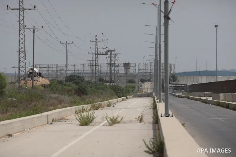 Palestinian ambulance drivers take part in a protest are called upon to pressure the Israeli to allow the free movement of patients through the Beit Hanoun checkpoint in front of the Erez Crossing in Beit Hanoun in the n...