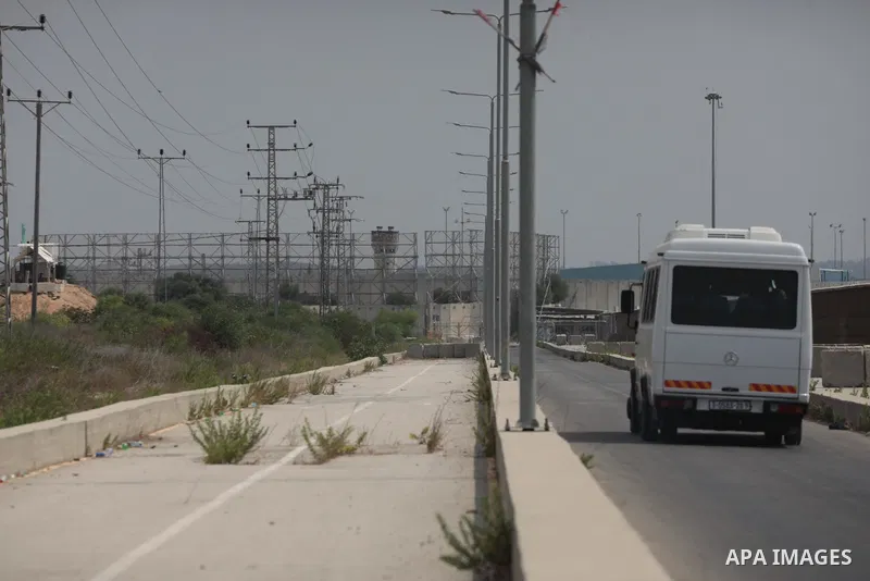 Palestinian ambulance drivers take part in a protest are called upon to pressure the Israeli to allow the free movement of patients through the Beit Hanoun checkpoint in front of the Erez Crossing in Beit Hanoun in the n...