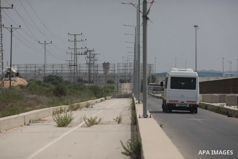 Palestinian ambulance drivers take part in a protest are called upon to pressure the Israeli to allow the free movement of patients through the Beit Hanoun checkpoint in front of the Erez Crossing in Beit Hanoun in the n...