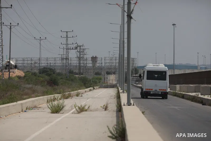 Palestinian ambulance drivers take part in a protest are called upon to pressure the Israeli to allow the free movement of patients through the Beit Hanoun checkpoint in front of the Erez Crossing in Beit Hanoun in the n...