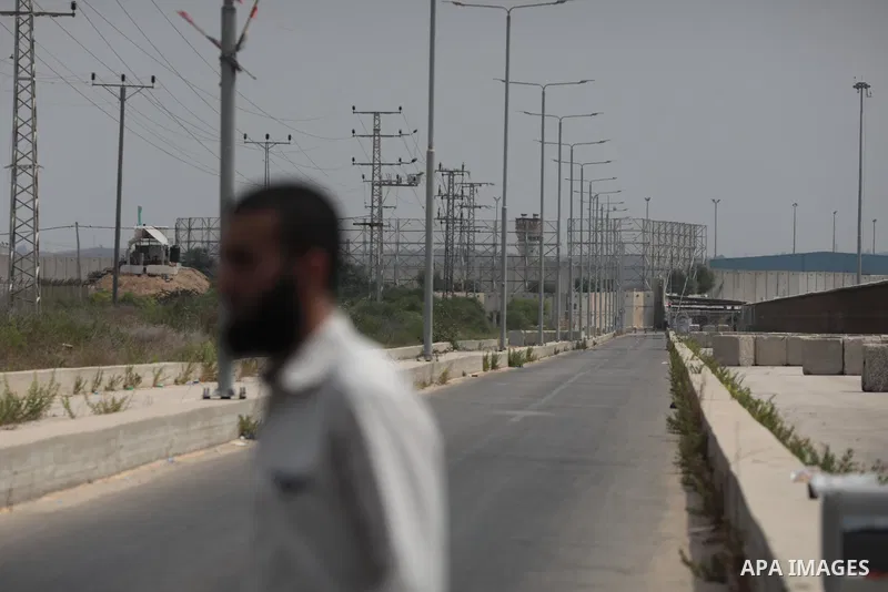 Palestinian ambulance drivers take part in a protest are called upon to pressure the Israeli to allow the free movement of patients through the Beit Hanoun checkpoint in front of the Erez Crossing in Beit Hanoun in the n...
