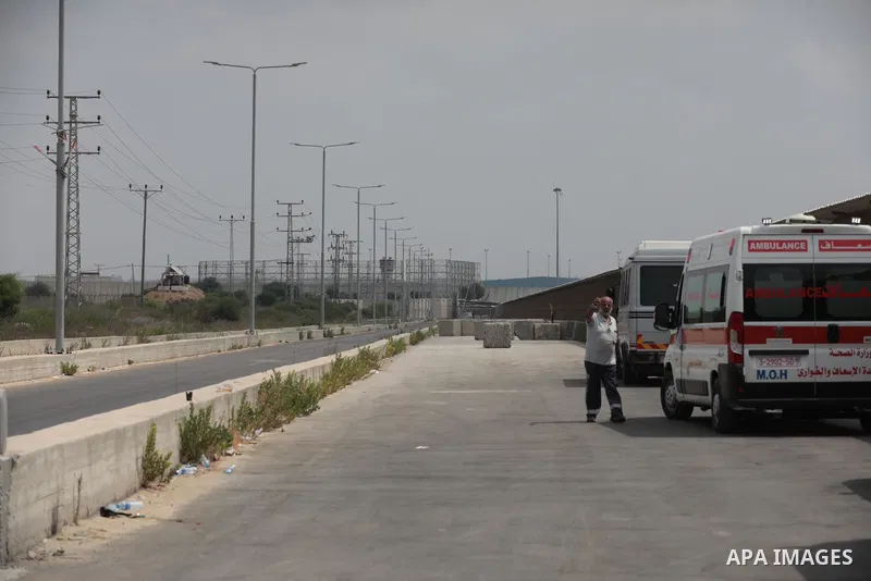 Palestinian ambulance drivers take part in a protest are called upon to pressure the Israeli to allow the free movement of patients through the Beit Hanoun checkpoint in front of the Erez Crossing in Beit Hanoun in the n...
