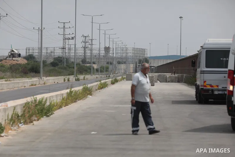 Palestinian ambulance drivers take part in a protest are called upon to pressure the Israeli to allow the free movement of patients through the Beit Hanoun checkpoint in front of the Erez Crossing in Beit Hanoun in the n...