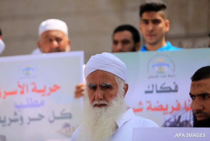 Members of the Palestine Scholars Association take part in a protest in solidarity with prisoners on hunger strike in Israeli jails, in front of Red Cross office, in Gaza city on August 31, 2022. There are currently 4500...