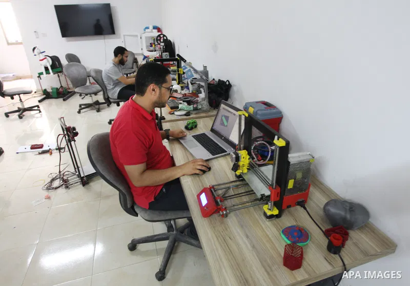 Palestinian engineer Mohammad Abu Matar, 35, uses 3D printing to produce the medical and educational equipment at a laboratory in Gaza City on August 31, 2022. Abu Matar, a specialist in digital manufacturing and 3D prin...