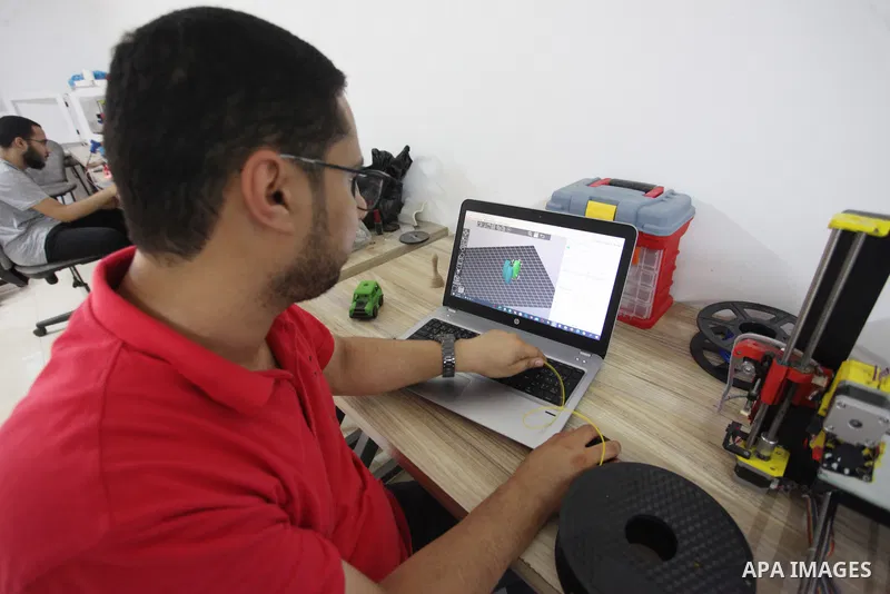 Palestinian engineer Mohammad Abu Matar, 35, uses 3D printing to produce the medical and educational equipment at a laboratory in Gaza City on August 31, 2022. Abu Matar, a specialist in digital manufacturing and 3D prin...