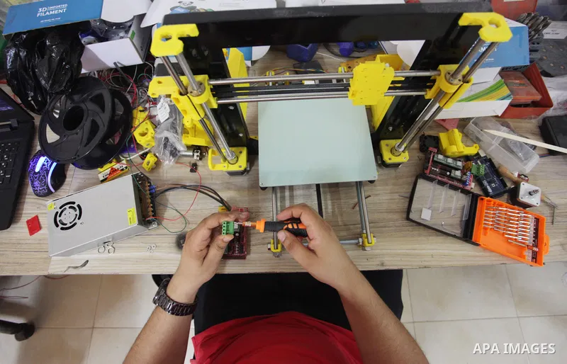 Palestinian engineer Mohammad Abu Matar, 35, uses 3D printing to produce the medical and educational equipment at a laboratory in Gaza City on August 31, 2022. Abu Matar, a specialist in digital manufacturing and 3D prin...