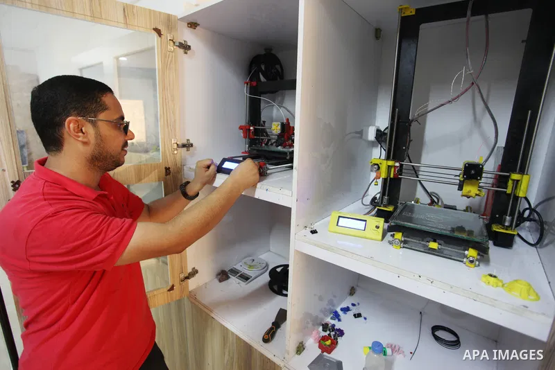 Palestinian engineer Mohammad Abu Matar, 35, uses 3D printing to produce the medical and educational equipment at a laboratory in Gaza City on August 31, 2022. Abu Matar, a specialist in digital manufacturing and 3D prin...