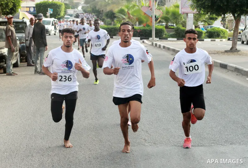 Palestinian runners participate in the Freedom Marathon on the occasion of Malaysian National Day, in Gaza city on August 31, 2022. Malaysia's Independence Day is celebrated on August 31st. Also known as Merdeka Day (Fre...