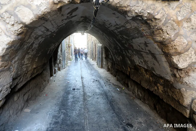 Palestinians inspect the damage to the house of Palestinian Mohammad Al-Azizi that was demolished by Israeli troops, in the West Bank city of Nablus on July 24, 2022. Clashes between Israeli security forces and Palestini...