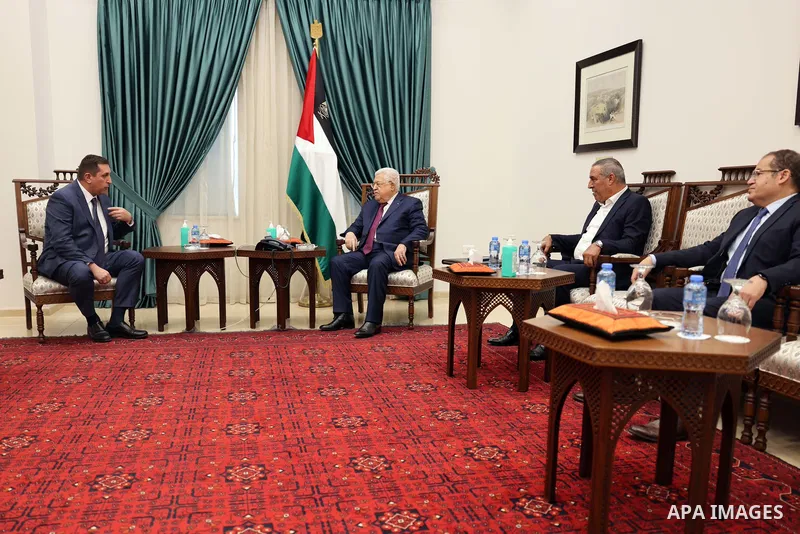 Palestinian President Mahmoud Abbas meets with the Russian Federation's envoy to the International Quartet in the West Bank of Ramallah on July 27, 2022. Photo by Thaer Ganaim