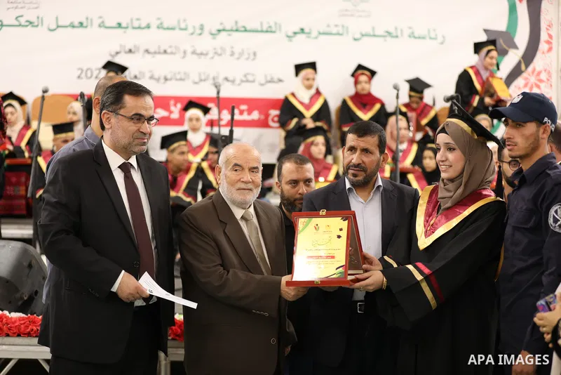 The high school Palestinian students, attend a honoring ceremony, in Gaza city on July 31, 2022. Photo by Atia Darwish