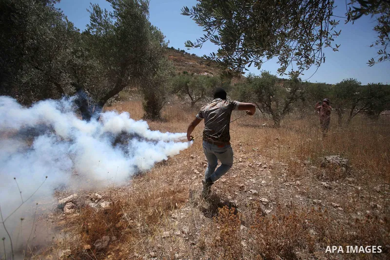 Palestinian protesters clash with Israeli forces during a demonstration against settlements in the village of Beita in the West Bank on July 01, 2022. Photo by Shadi Jarar'ah