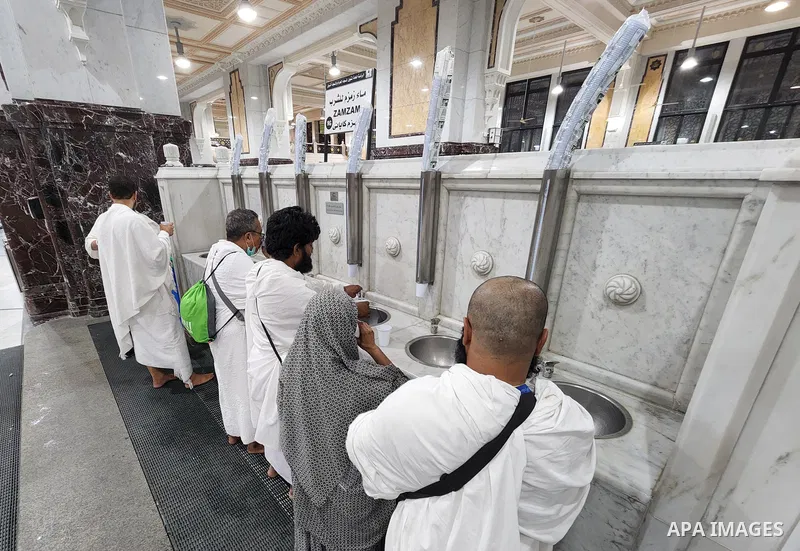 Palestinian Muslims pilgrims drink Zamzam water during the annual hajj pilgrimage, in Mecca, Saudi Arabia, on July 02, 2022. Annual Saudi Arabia welcomed its first batch of hajj pilgrims since before the coronavirus pand...