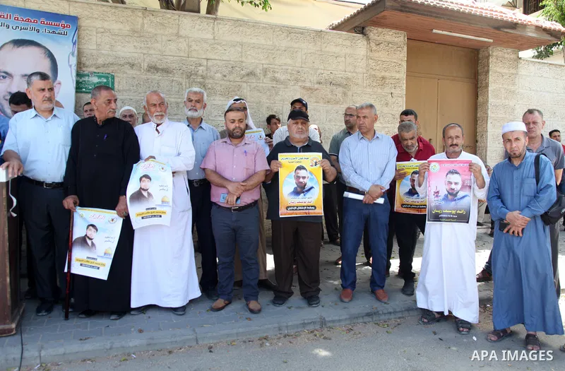 Palestinians take part in a protest to show solidarity with prisoners held in Israeli jails, in front of Red cross office in Gaza city, on July 06, 2022. According to the latest figures from Addameer, the Palestinian Pri...