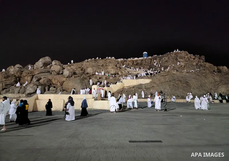 Muslim pilgrims pray on Mount Arafat, as Jabal al-Rahma near Mecca, as they take part in one of the Hajj rituals southeast of the Saudi holy city of Mecca on July 8, 2022. Arafat is the site where Muslims believe the Pro...