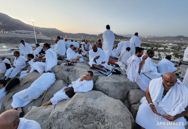 Muslim pilgrims pray on Mount Arafat, as Jabal al-Rahma near Mecca, as they take part in one of the Hajj rituals southeast of the Saudi holy city of Mecca on July 8, 2022. Arafat is the site where Muslims believe the Pro...