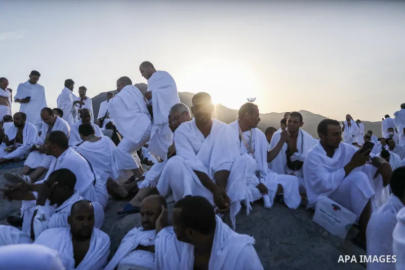 Muslim pilgrims pray on Mount Arafat, as Jabal al-Rahma near Mecca, as they take part in one of the Hajj rituals southeast of the Saudi holy city of Mecca on July 8, 2022. Arafat is the site where Muslims believe the Pro...