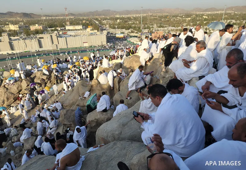 Muslim pilgrims pray on Mount Arafat, as Jabal al-Rahma near Mecca, as they take part in one of the Hajj rituals southeast of the Saudi holy city of Mecca on July 8, 2022. Arafat is the site where Muslims believe the Pro...