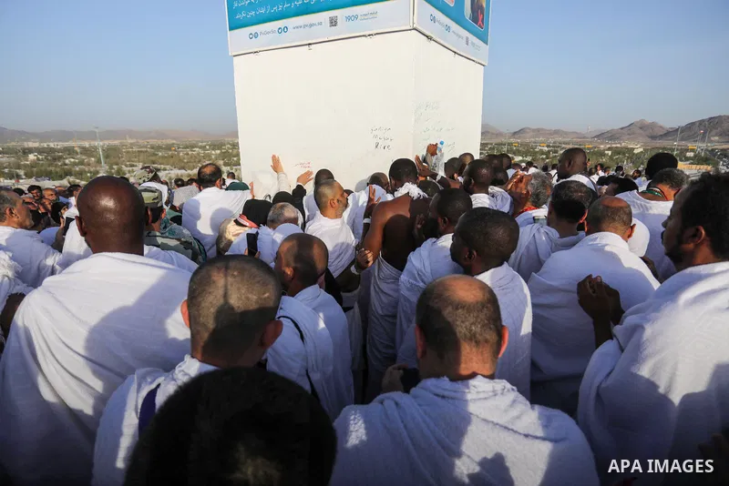 Muslim pilgrims pray on Mount Arafat, as Jabal al-Rahma near Mecca, as they take part in one of the Hajj rituals southeast of the Saudi holy city of Mecca on July 8, 2022. Arafat is the site where Muslims believe the Pro...