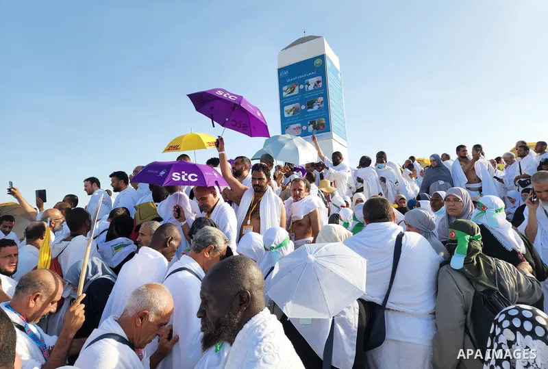 Muslim pilgrims pray on Mount Arafat, as Jabal al-Rahma near Mecca, as they take part in one of the Hajj rituals southeast of the Saudi holy city of Mecca on July 8, 2022. Arafat is the site where Muslims believe the Pro...