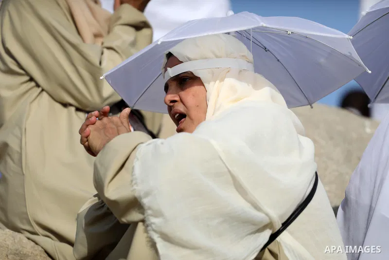 Muslim pilgrims pray on Mount Arafat, as Jabal al-Rahma near Mecca, as they take part in one of the Hajj rituals southeast of the Saudi holy city of Mecca on July 8, 2022. Arafat is the site where Muslims believe the Pro...