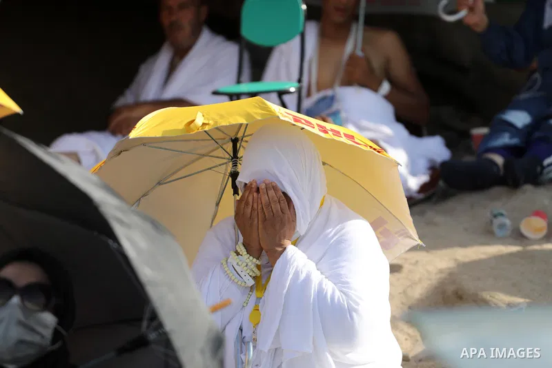 Muslim pilgrims pray on Mount Arafat, as Jabal al-Rahma near Mecca, as they take part in one of the Hajj rituals southeast of the Saudi holy city of Mecca on July 8, 2022. Arafat is the site where Muslims believe the Pro...