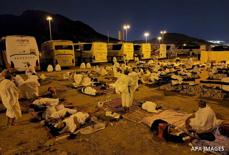 Muslim pilgrims collect stones on their way to Jamarat to stone the devil as part of the annual Islamic Hajj pilgrimage during the first day of Eid Al Adha in Mecca, Saudi Arabia on July 8, 2022. Photo by Ashraf Amra