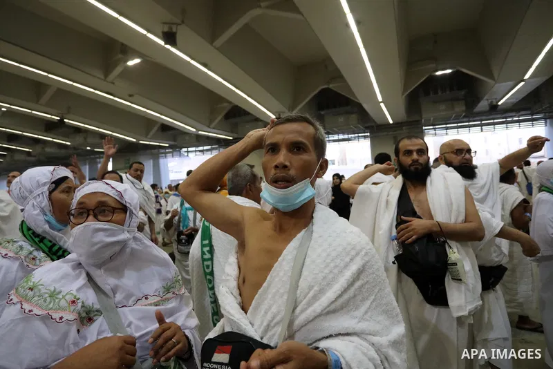 Muslim worshippers cast stones as part of a symbolic stoning of the devil ritual, during the Hajj pilgrimage in Mina, near Saudi Arabia's holy city of Mecca on July 09, 2022. From first light, small groups of pilgrims ma...