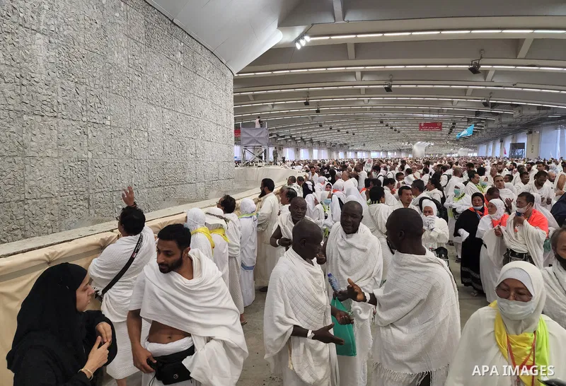 Muslim worshippers cast stones as part of a symbolic stoning of the devil ritual, during the Hajj pilgrimage in Mina, near Saudi Arabia's holy city of Mecca on July 09, 2022. From first light, small groups of pilgrims ma...